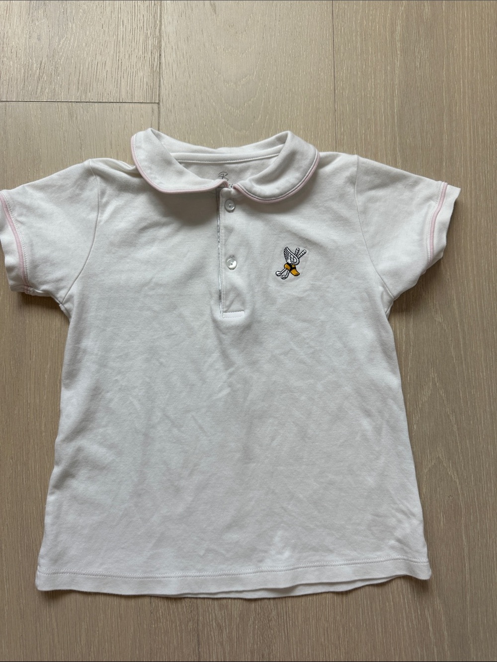 Girls Golf White Polo Shirt with Pink Trim an